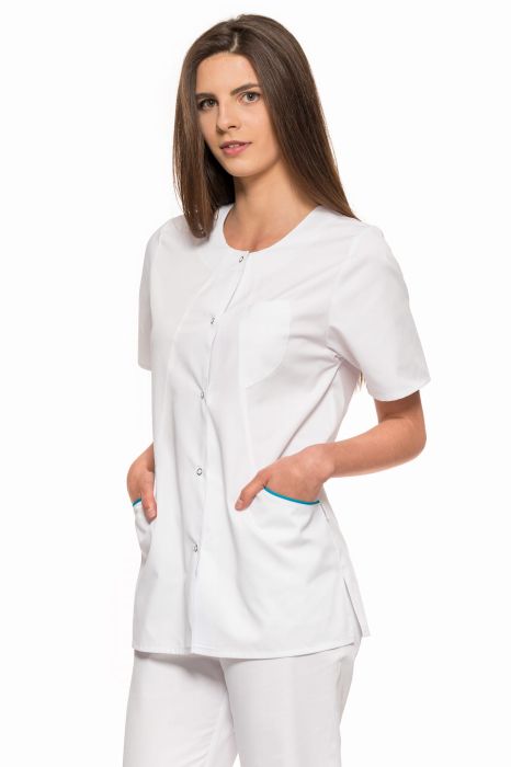 Żakiet medyczny Teresita – fason w linii „A” z kontrastową wypustką, asymetryczną kieszenią i luźnym krojem zapewniającym wygodę.