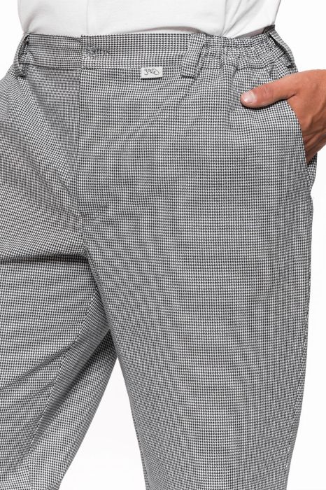 Spodnie gastronomiczne klasyczne – długie spodnie z prostym krojem, kieszeniami, szlufkami i gumkami w pasie.